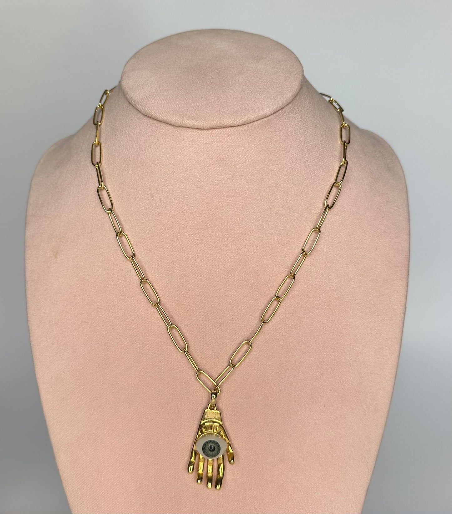 Collar manita ojo