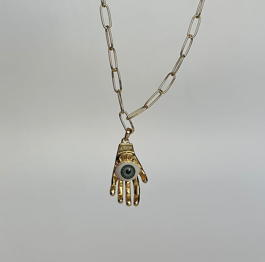 Collar manita ojo