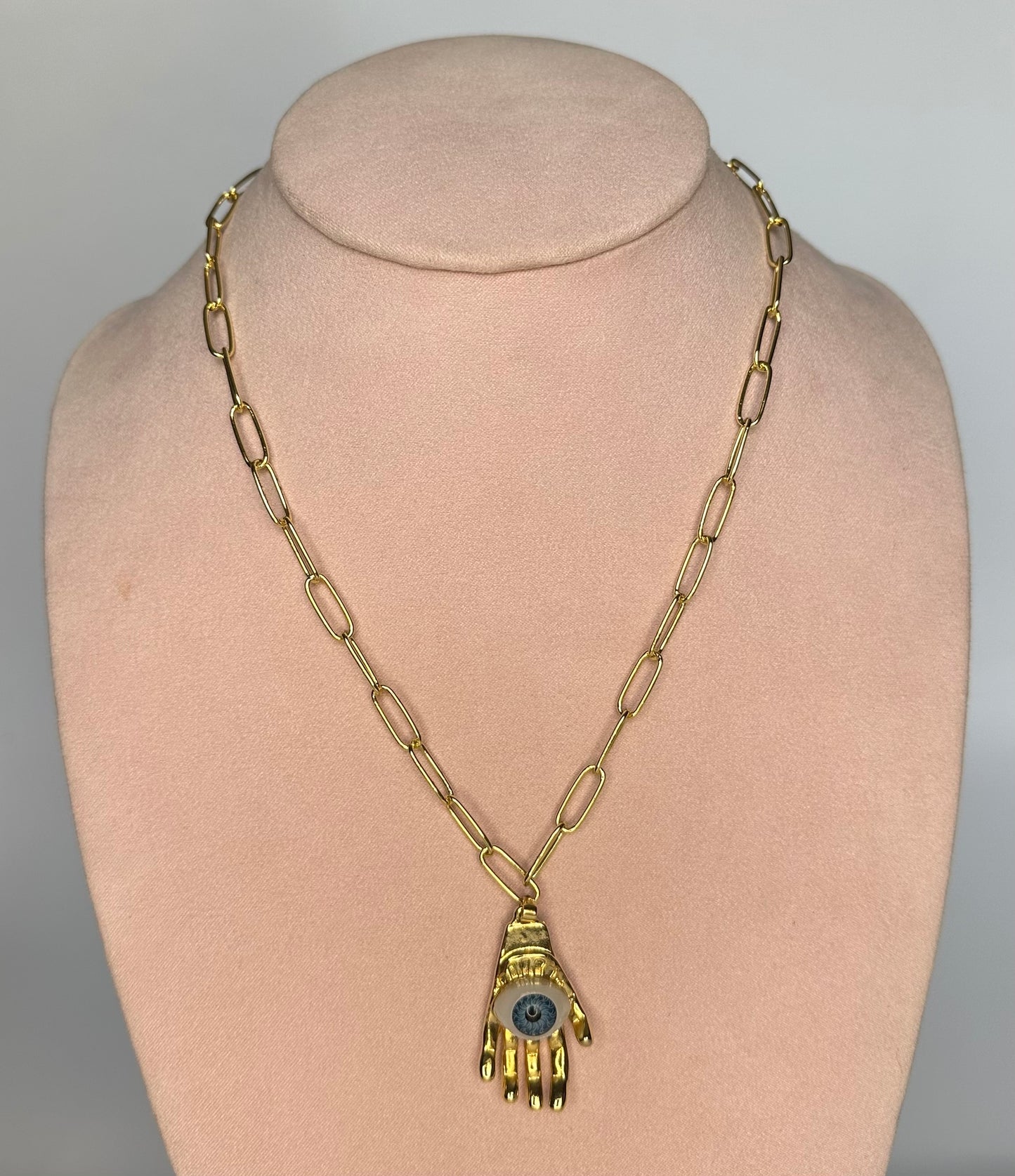 Collar manita ojo