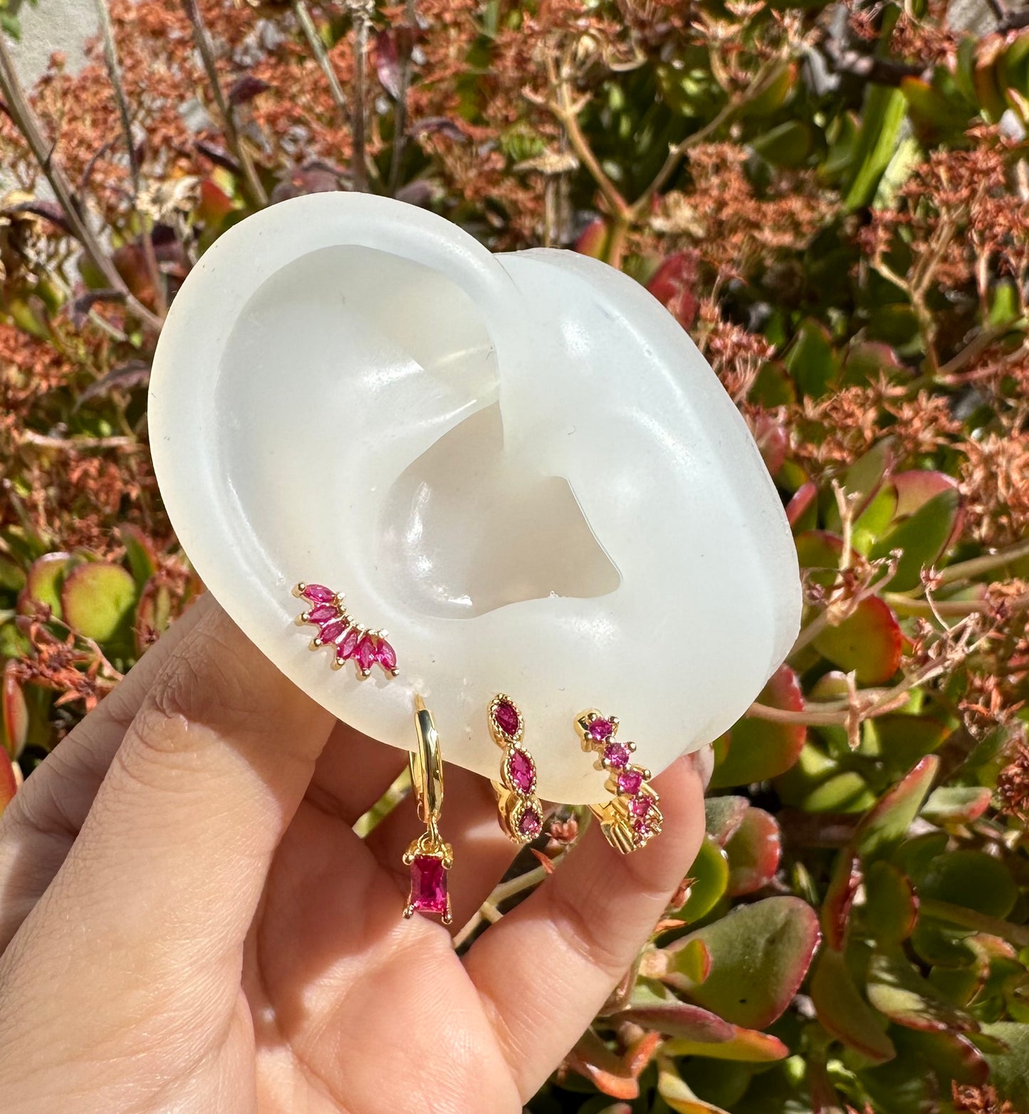 Studs abanico fucsia