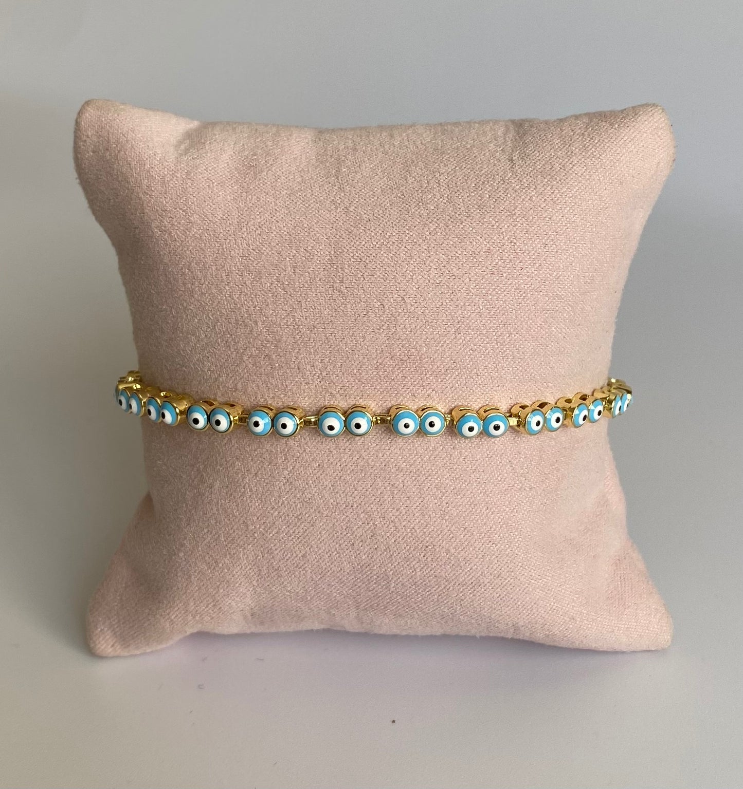 Pulsera mini ojitos