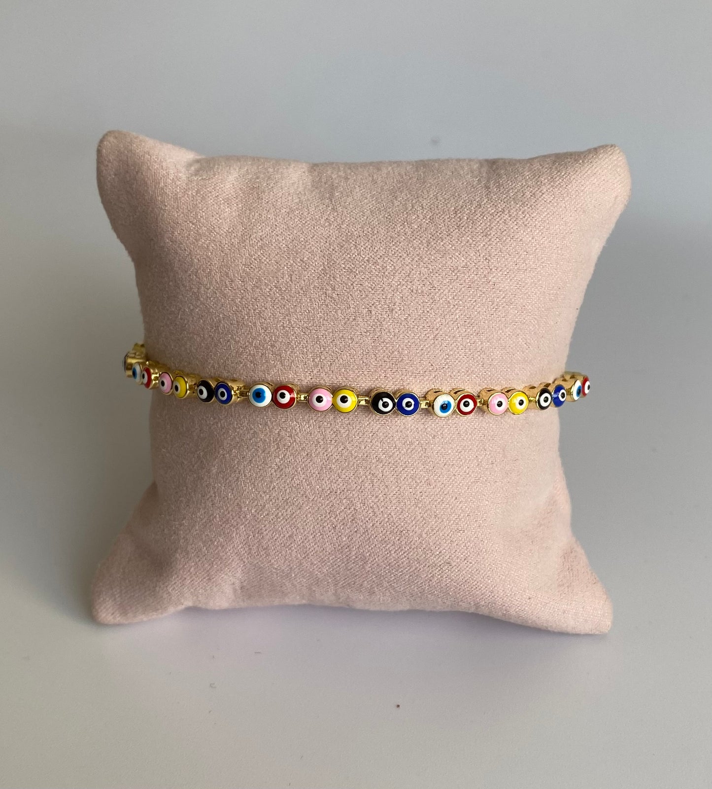 Pulsera mini ojitos