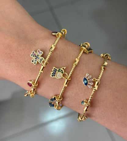 Pulsera rígida dijes