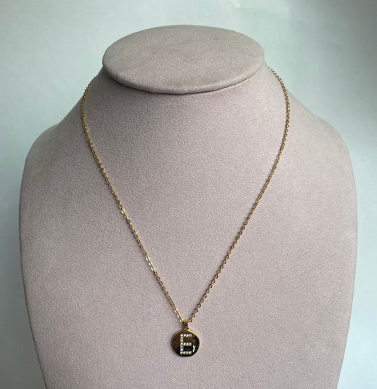 Inicial moneda